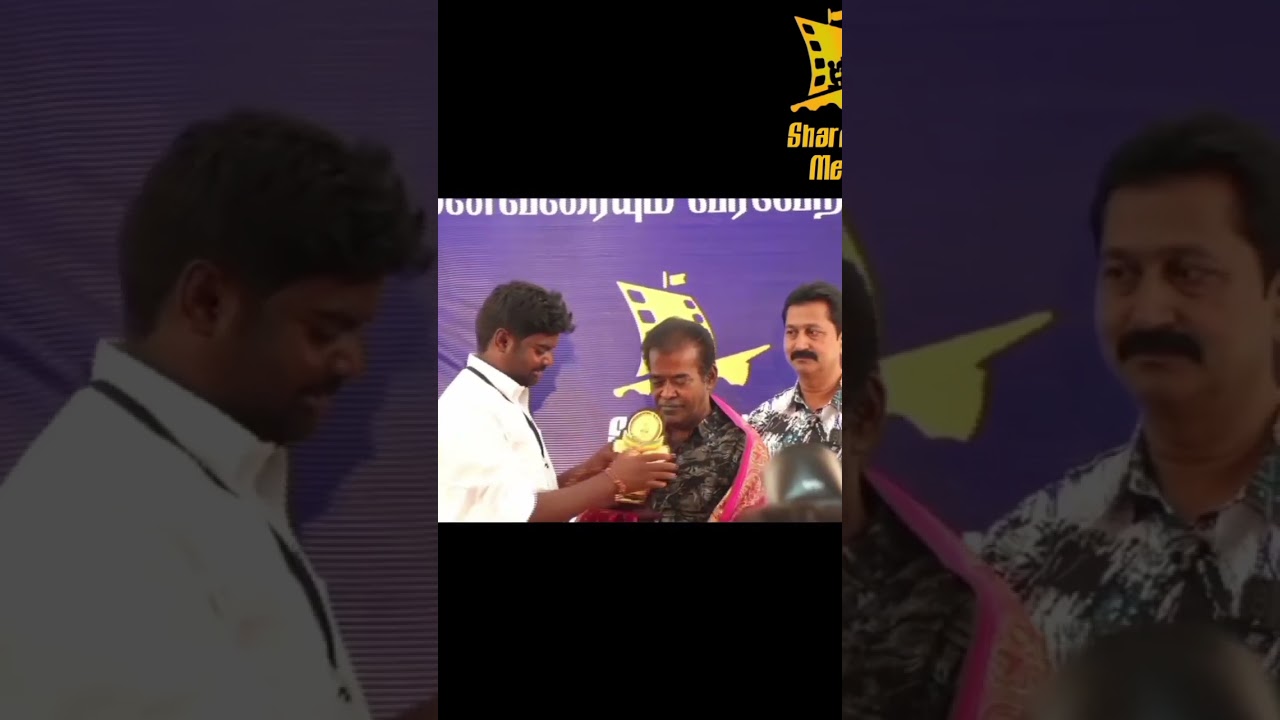 Filmmaker Chaplin Balu honored him with a shawl on behalf of SHARESHIP MEDIA