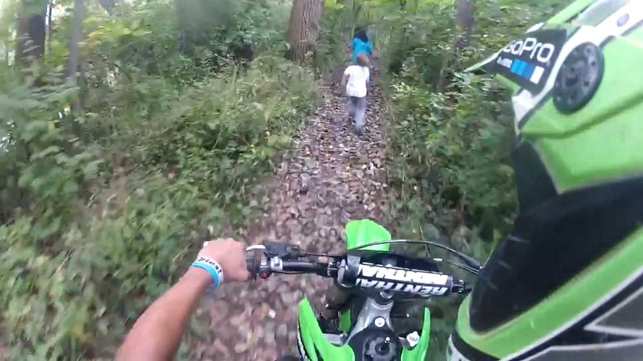 Kids run away from dirtbike!