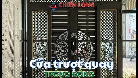 Cửa trượt quay 4 cánh Trống đồng, Cá chép - Sơn Tĩnh điện , Nẹp viền inox, Tay cầm phong cách