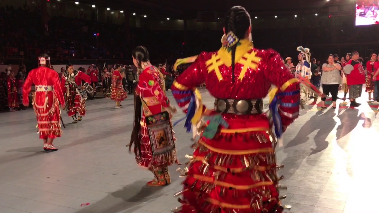 Tia Wood Heads a Sea of Red Jingle Dancers 2017 GON Tribute