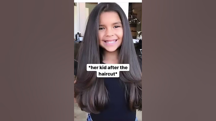 My mom explaining the haircut to the hairstylist