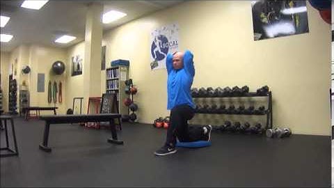 Half Kneeling Dumbbell Tricep Extension