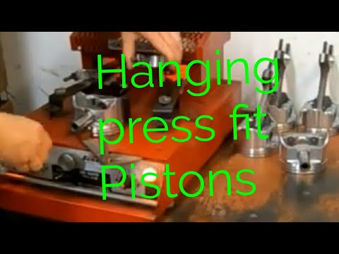 Installing pistons on connecting rods