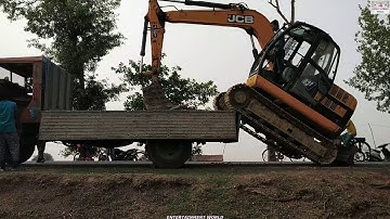 Jcb Excavator Video - Jcb Excavator JS 81 Loads Itself On Shaktimaan Truck.