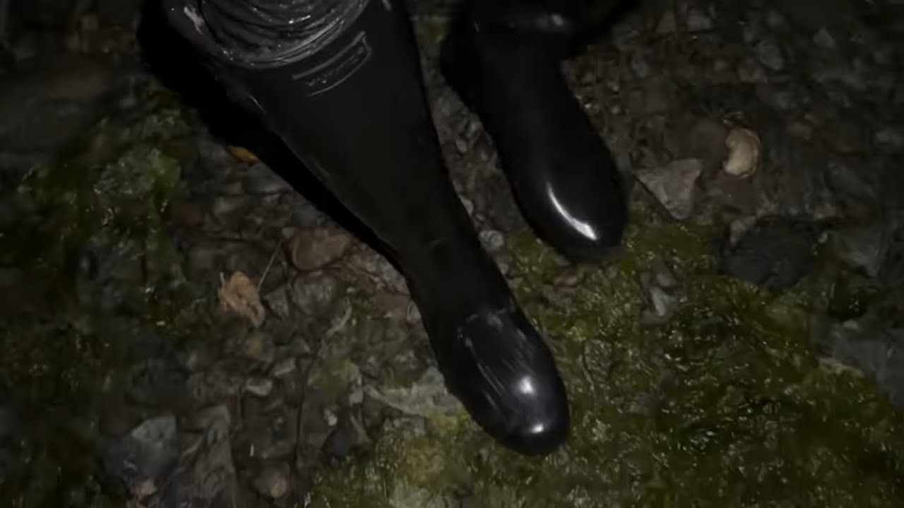 Gloss refined hunter boots in deep mud
