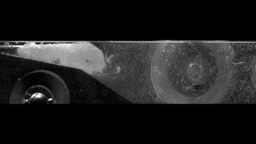 Visualization and measurements of shock waves in cavitating flow