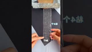 Create a fun and interactive squeezing square box using transparent tape.