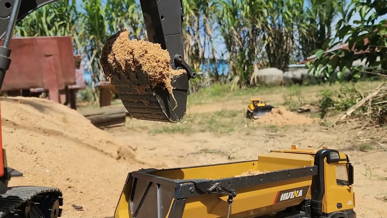 Precision Loading: RC Excavator Bucket Dropping Dirt