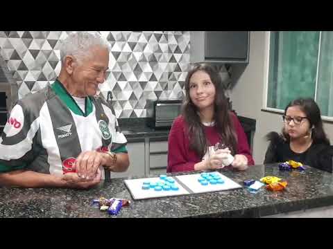 Playing with my granddaughters. A game I made myself using recyclables