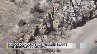 Crews blast hard rock formations on Highway 180 near Silver City