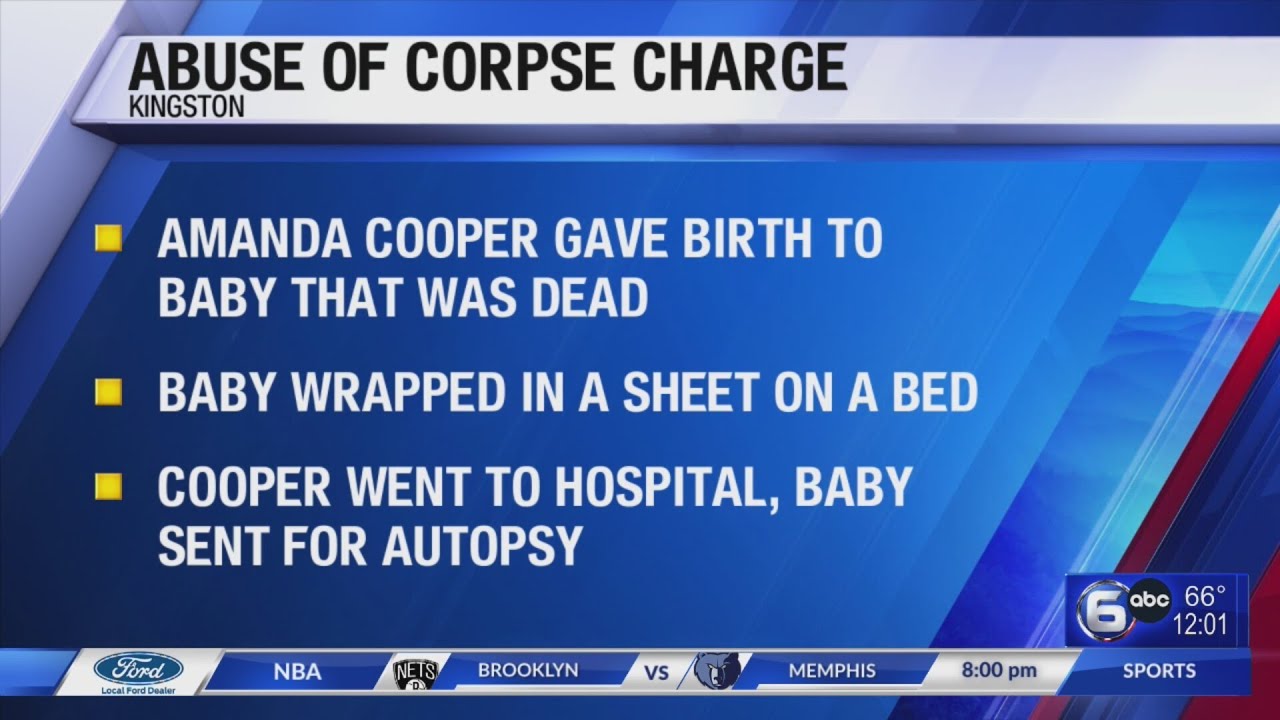 Woman charged with abuse of a corpse after baby found dead in Kingston ...