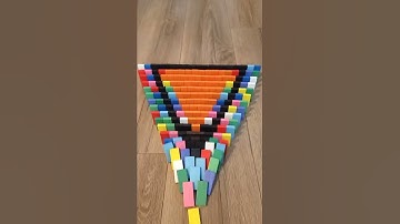 Domino triangle in slow motion