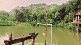 water Powered Pounder corn mill live