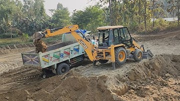 JCB Backhoe Cutting Soil and Loading in Dump Truck - JCB Tractor Working Video
