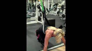 Anne doing push-ups with the Pull-up Revolution Pro