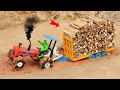 Full trolley wood loaded mini diy tractor stuck in mud on dangerous situation sanocreator
