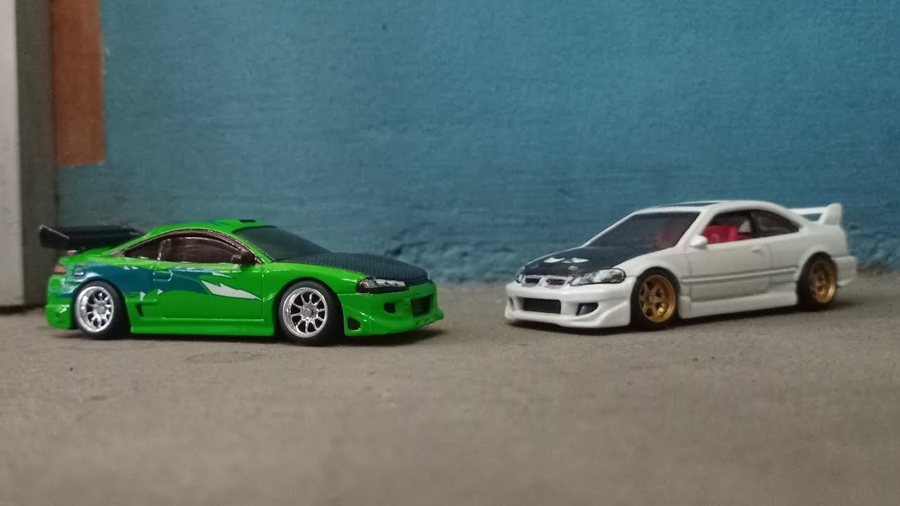 Hot Wheels Mitsubishi Eclipse 2005 – Modèle 1/64 Orange – Série Mainline Realistix