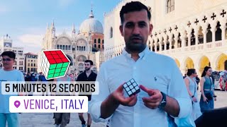 Mukhtar Kakar solves the Rubik’s Cube in 5 min and 12 sec in Venice, Italy ??