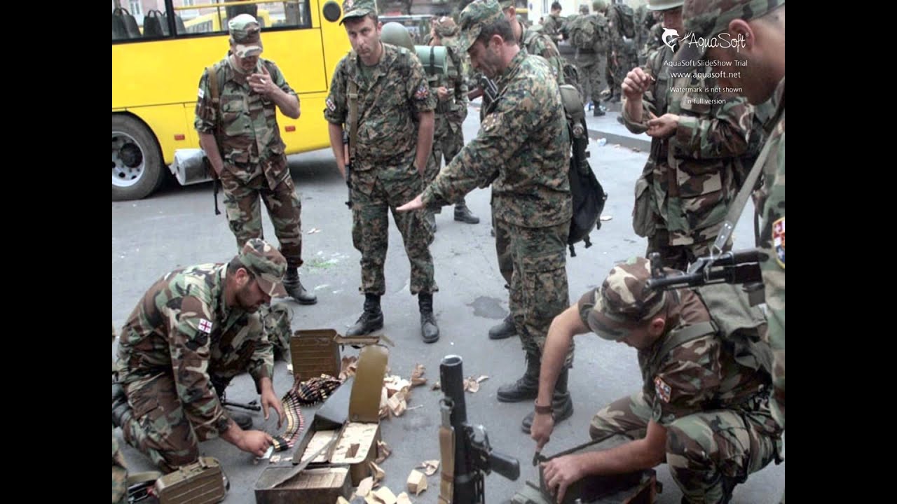 Нападение на осетию. Цхинвали 2008 грузинские солдаты. Ополченцы Южная Осетия 2008. Вооруженный конфликт в Южной Осетии 2008.