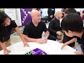 Tennis great Andre Agassi talks with kindergarteners at Modesto school he help build