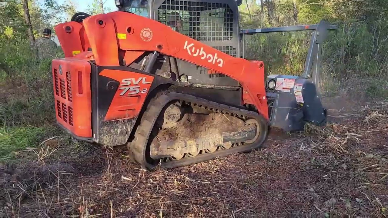 Kubota SVL 75-2 with Loftness Battle Axe Vs Bobcat T595 with Fecon