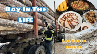 Log Truck Driver Hauling Logs In Winter From Dawn To Afternoon On Muddy Trails And On Snowy Days