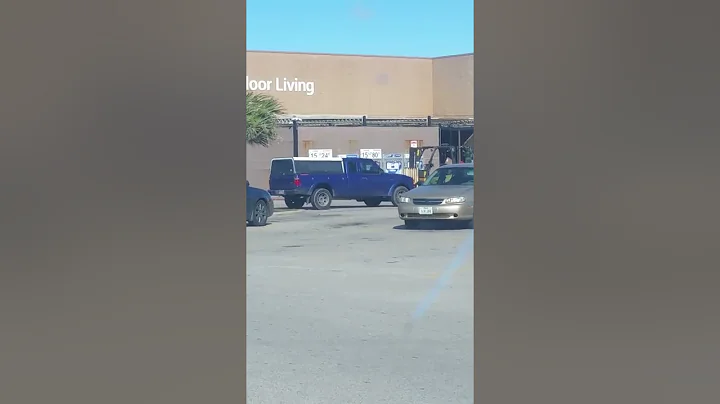 Walmart associate fights battle against high winds
