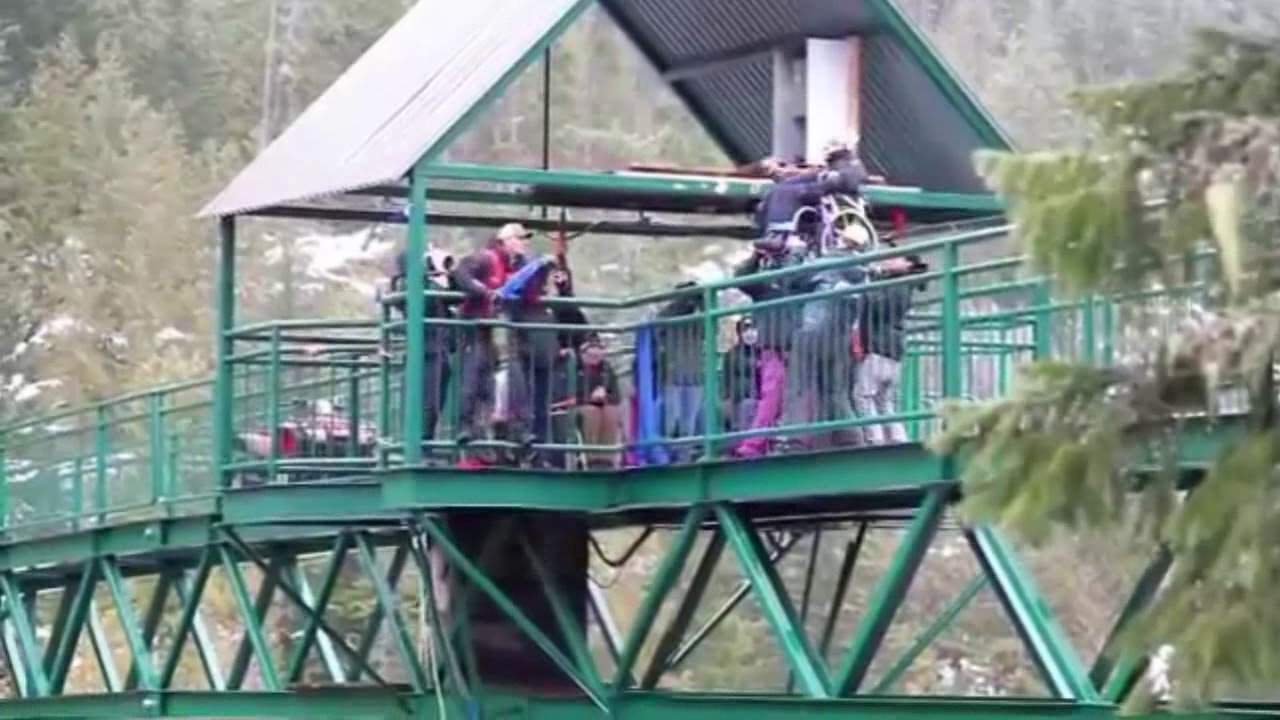 girl in a wheelchair thrown off a bridge in the snow YouTube