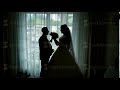 Silhouettes Of The Bride And Groom On The Window Background 