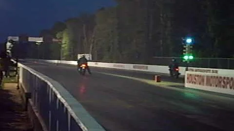 Eric Estes motorcycle lose control drag race in Ho...