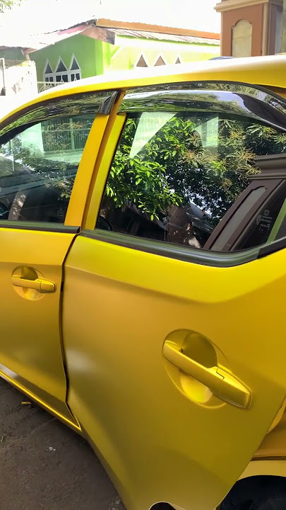 wrapping stiker kuning gold honda brio