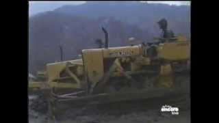 Mel Gibson running a John Deere 450B Bulldozer.