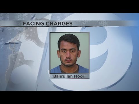 Two refugees at Fort McCoy facing federal charges