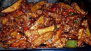 you will never throw leftover fries or wedges after seeing this! honey chili potato recipe