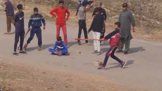 How to Play Gulli Danda Cricket #traditionalsports #gullycricket #gullidanda by Curiosity 28 views 2 months ago 6 minutes, 3 seconds