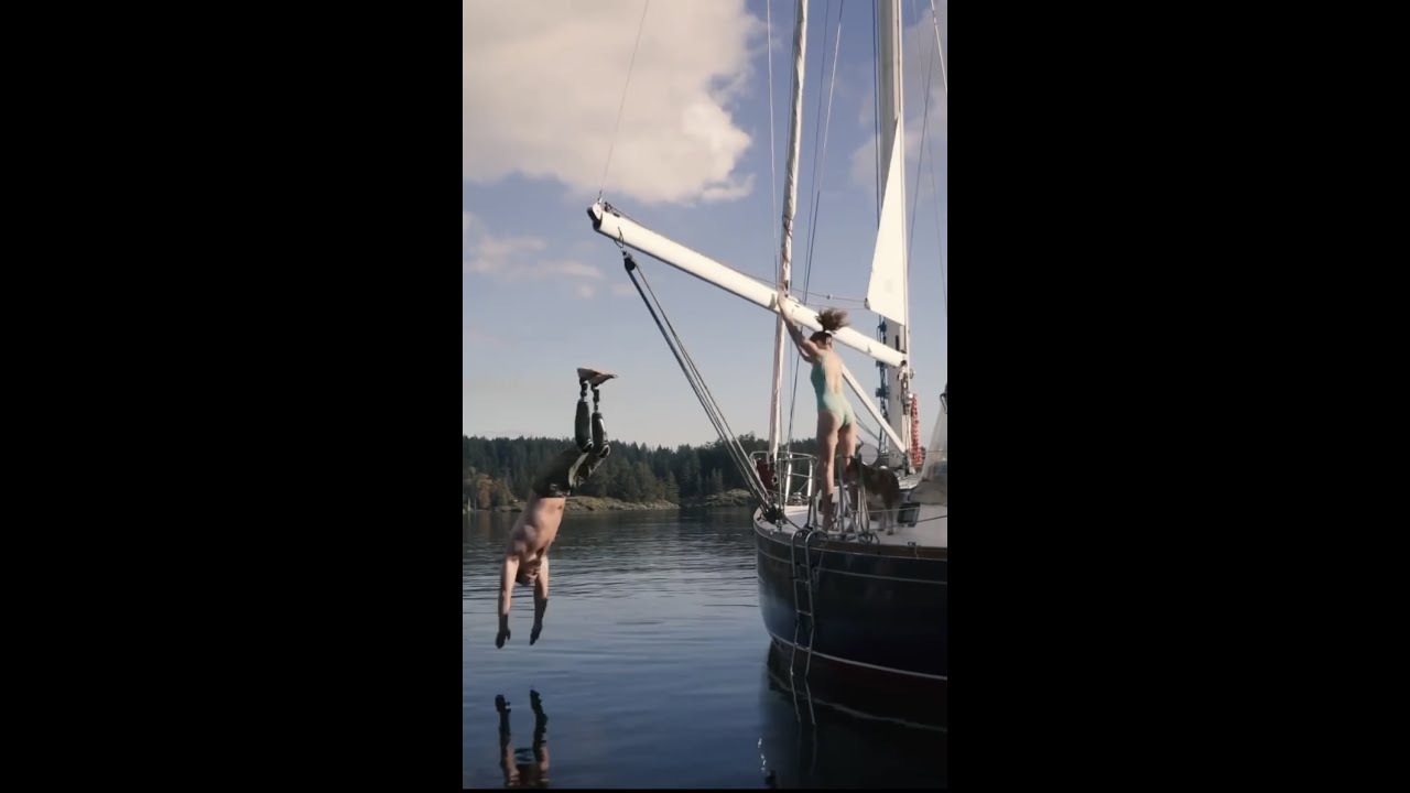 Sketchy DOUBLE AMPUTEE DIVE off sailboat