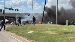 Witnesses tried to save driver after semi-truck went off highway overpass in Allen