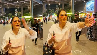 Beauty Isha Kopikar Saves Pap From Falling Walking Backwords At Airport