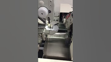 Automatic hook loop tape cutting stitching machine
