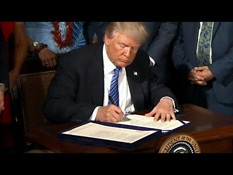Watch Now: President Trump signs the John S. McCain National Defense Authorization Act for 2019