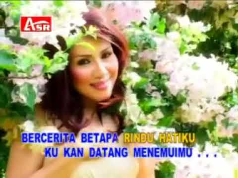 Rita Sugiarto - Bulan Diranting Cemara - (Official Video Karaoke)