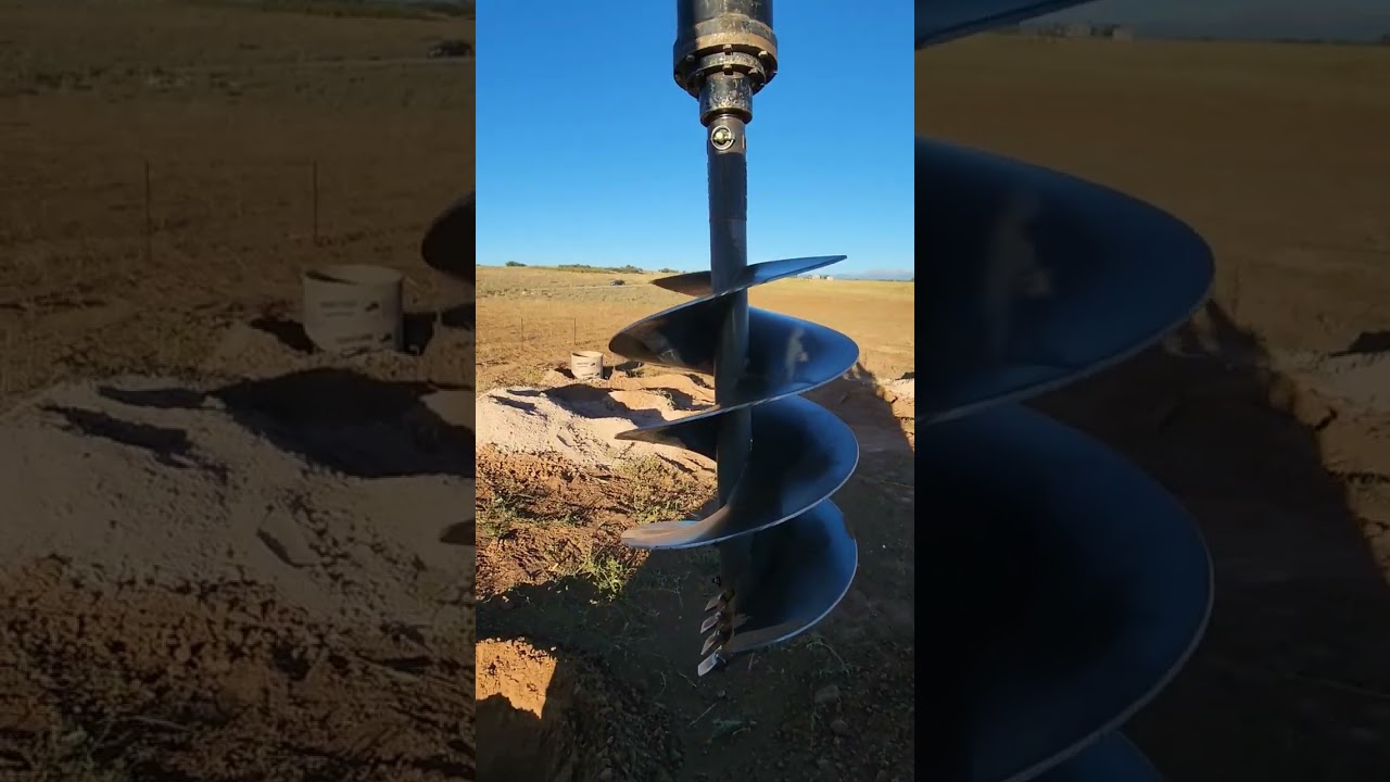 2ft diameter auger+bobcat skid digging 5ft deep hole
