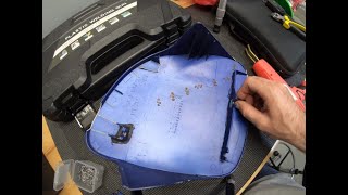 Repairing the broken headlight cover on the FD3S RX-7.