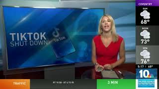 Blonde Bimbo on her phone during the news