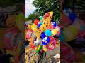 beli balon jerapah dan doraemon biru dipasar minggu