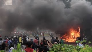 Protests turn violent over Indonesia's new investment law