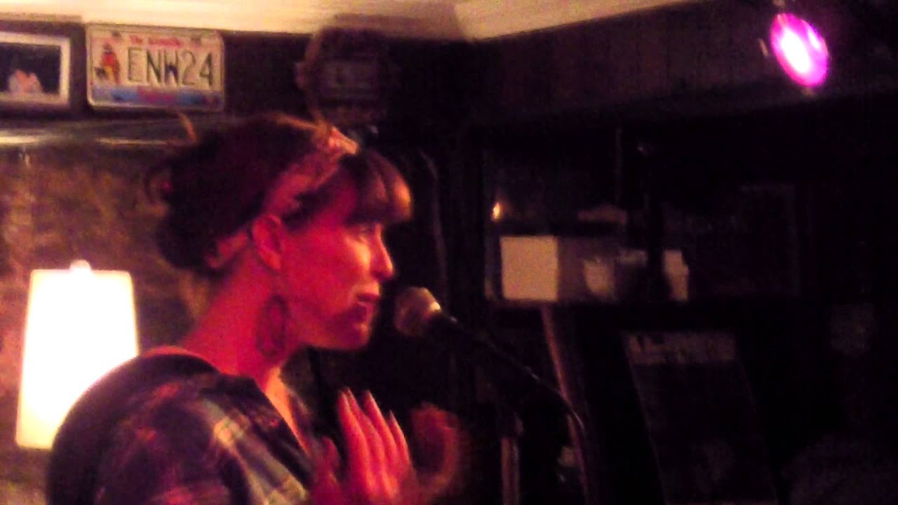 a stranger at Grumpy's open mic in montreal