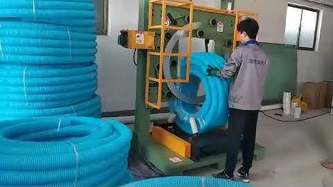Vertical hose coil wrapping machine