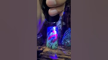 Ruby Zoisite under UV lamps | Ruby Glows under fluorescence Lights | LabradoriteKING.com