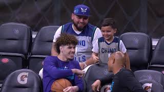 LAMELO SIGNS KIDS CHINO HILLS JERSEY AT MAGIC GAME (MAKES HIS DAY)